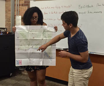 Two students, Catherine and Jair, interpret cartography of resistance